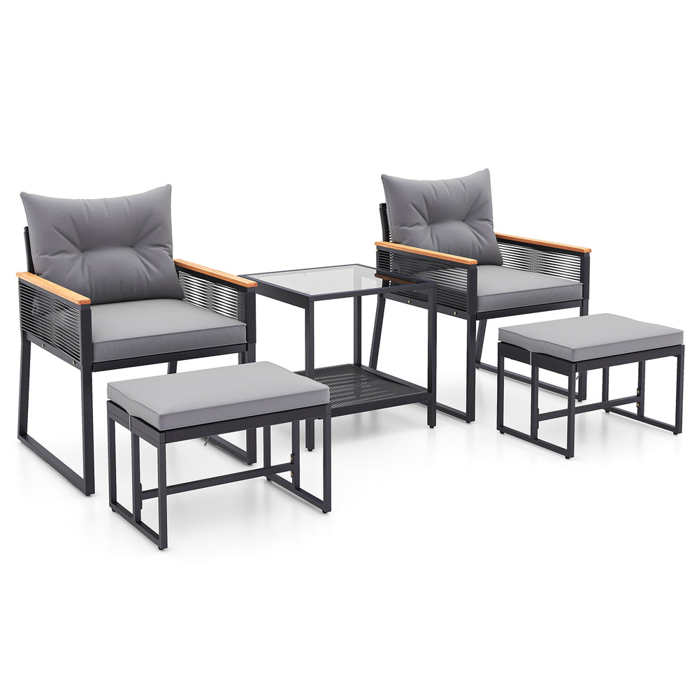 5-piece outdoor rattan conversation set with gray cushions, includes 2 armchairs, 2 ottomans, and a 2-layer side table.