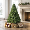 5 FT artificial Christmas tree with 519 full branch tips, featuring a hinged design and surrounded by wrapped gifts.