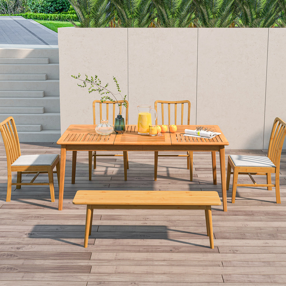 Rectangular acacia wood dining table for 6 with natural finish, perfect for outdoor gatherings on patio or backyard.