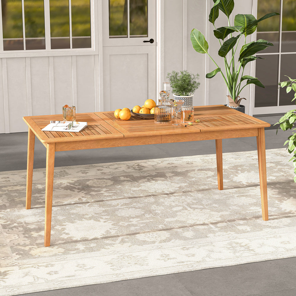 Rectangular acacia wood dining table for 6 with natural finish, perfect for outdoor gatherings and featuring an.