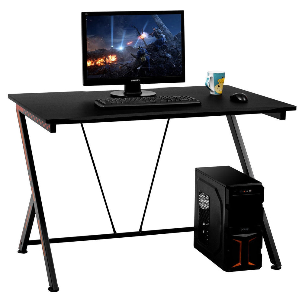 Modern ergonomic study computer desk with large MDF surface, steel frame, and ample space for monitor and keyboard.
