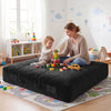 Kids play on a 60-inch black crash pad with a velvet cover, perfect for sensory input and soft impact absorption.