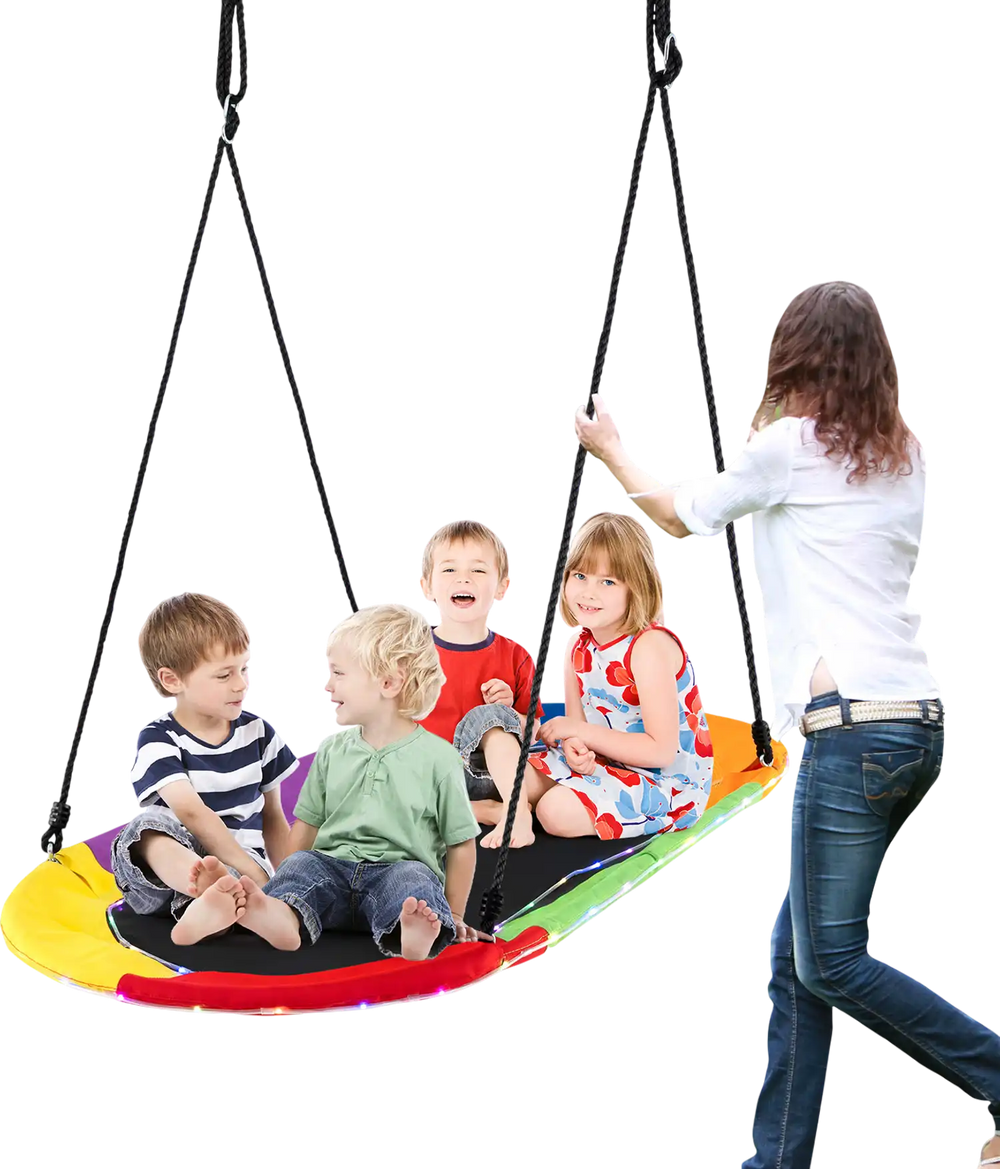 Colorful 60-inch saucer swing with LED lights, holding multiple kids, perfect for outdoor fun and nighttime play.