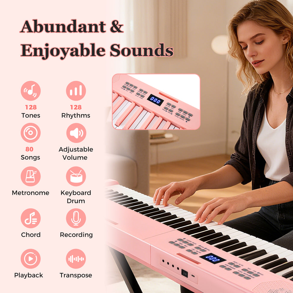 61-key foldable pink piano keyboard with 128 tones and rhythms, ideal for music learning and portable enjoyment.