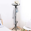 Wood standing coat rack in black with curved hooks and umbrella stand, perfect for stylish entryway organization.
