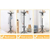 Wood standing coat rack with umbrella stand in black, featuring curved hooks and compact design for stylish storage.