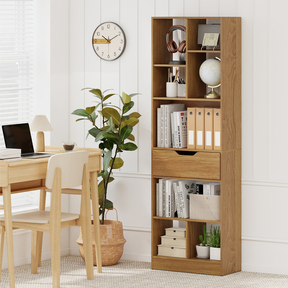 Tall freestanding bookcase with 8 open cubes and a drawer in natural finish, perfect for organizing books and decor.