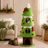 Green 62" Christmas cat tree with three cozy condos and hanging balls, shown with a cat in a festive living room.