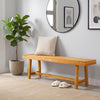 Solid wood bench in natural teak finish, 63 inches long, perfect for dining or entryway use, seating up to 3 people.