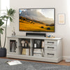 Gray 63-inch media console table with 3 drawers and 2 glass shelves, ideal for living room or bedroom storage.