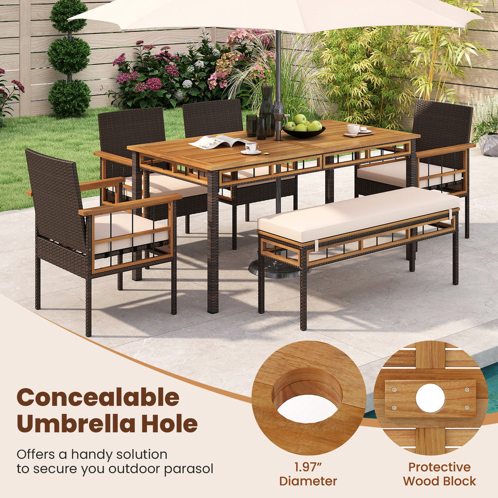 63" outdoor dining table with acacia wood slatted top and PE rattan legs, featuring a 1.97" umbrella hole for patio use.