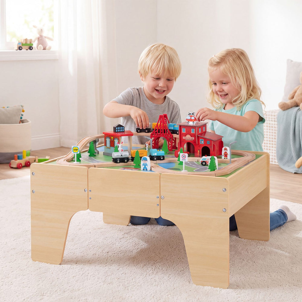 63 Piece Kids Train Table with Storage Drawer and Reversible Tabletop-Natural, shown in use with toy tracks and bridge.