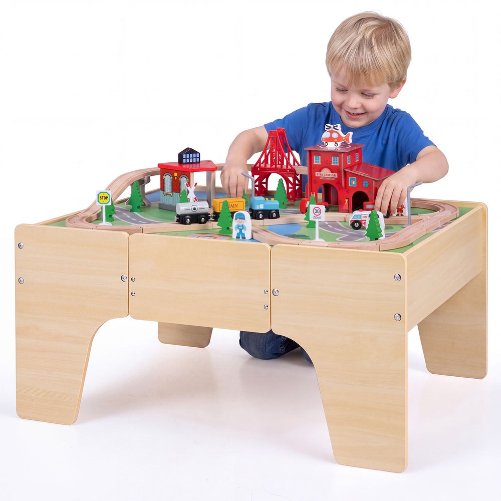 63 Piece Kids Train Table with Storage Drawer and Reversible Tabletop-Natural shown in use with toy tracks and accessories.