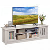 Spacious 63” wooden farmhouse TV stand in white with fluted doors and three open compartments for TVs up to 70".