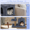 Cozy dark grey cat tree featuring two large condos, jute scratching posts, and plush surfaces for indoor cats.