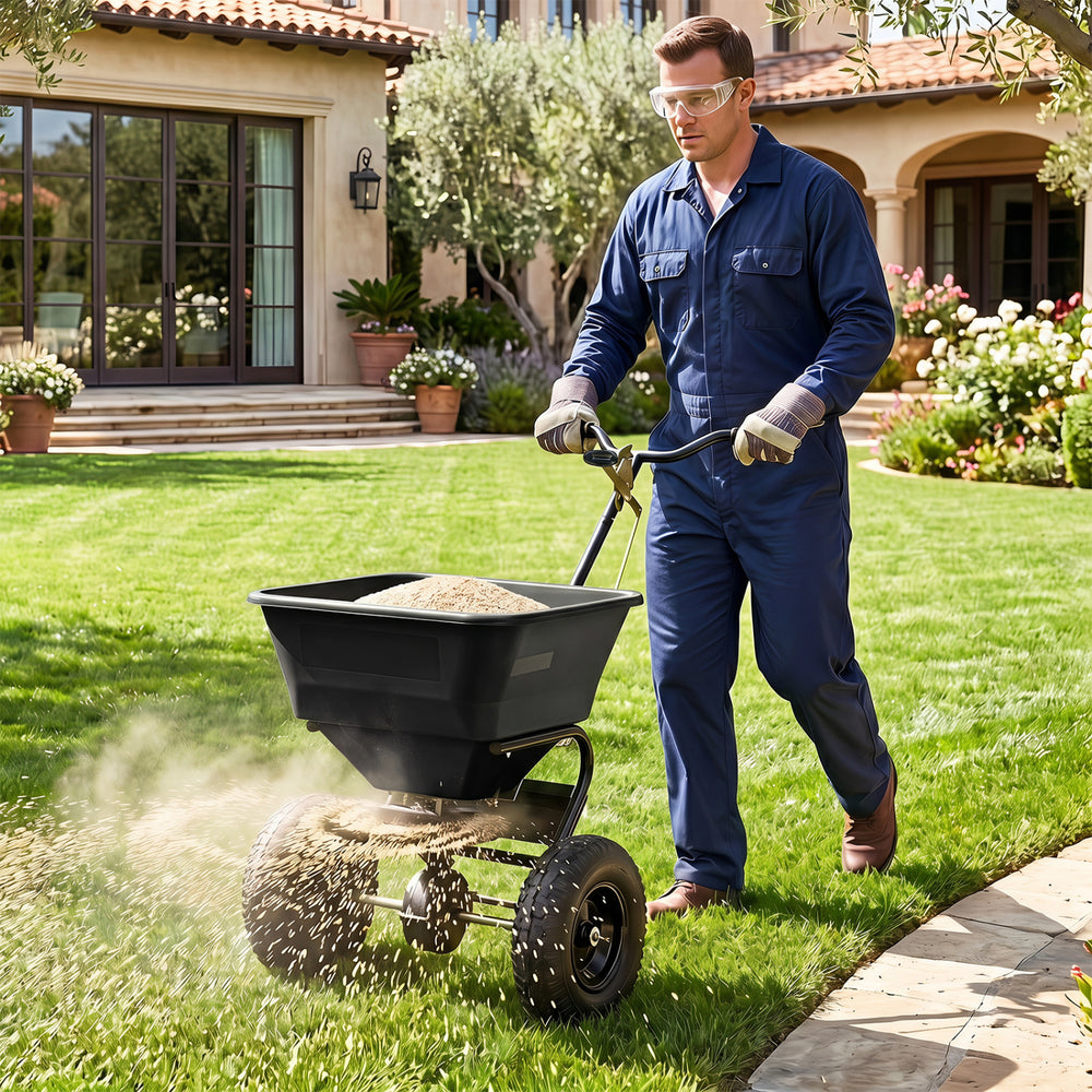66 LBS Walk-Behind Broadcast Spreader with 13 Inch All-Terrain Tires-Black - Gallery View 1 of 12