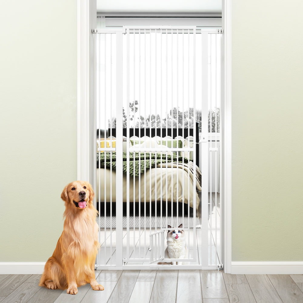 Extra tall 67.5" white metal pet gate with 30.5"-41" wide opening, ideal for doorways and kitchens, featuring a small.