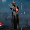 Life-sized Halloween animatronics witch with glowing crimson eyes, ragged robe, and magical ball for spooky decor.