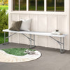 White 6-foot plastic folding bench with carrying handle, suitable for camping, dining, or outdoor seating.