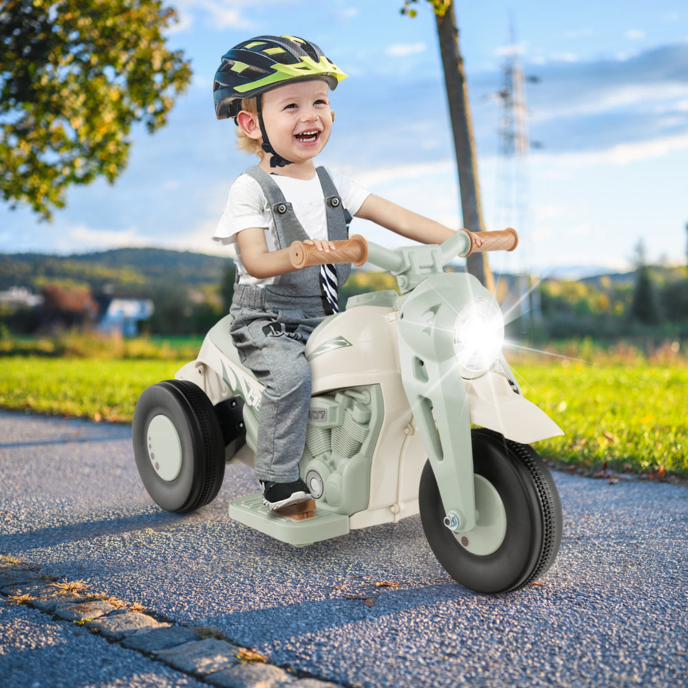 Kids electric ride-on motorcycle in beige with LED headlight, music, and bubble maker for fun outdoor adventures.