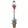 6.1 feet pre-lit Christmas street lamp features snow-flocked greenery, red bow, and LED lights for festive decoration.