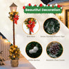 6.1 feet pre-lit Christmas street lamp with snow-flocked branch tips, red bow, and white berries for festive decoration.