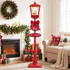 Red 6.1 ft musical Christmas streetlight with LED lights, featuring a Santa scene and snowflakes for festive decoration.