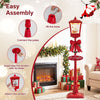 6.1 ft red musical Christmas streetlight with LED lights, featuring a Santa scene and snowflakes for festive decoration.