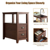 Compact brown end table with 2 drawers and shelf, featuring rustic metal handles, ideal for bedroom or living room.