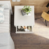 White wooden nightstand with two storage drawers, perfect for bedside decor and efficient space use in any room.