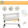 Travel portable baby bed side sleeper in beige with adjustable heights and tilt design for safe, comfortable sleep.