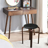 Bentwood round stool with padded black seat, featuring sturdy legs and non-slip foot pads, ideal for dining or casual.