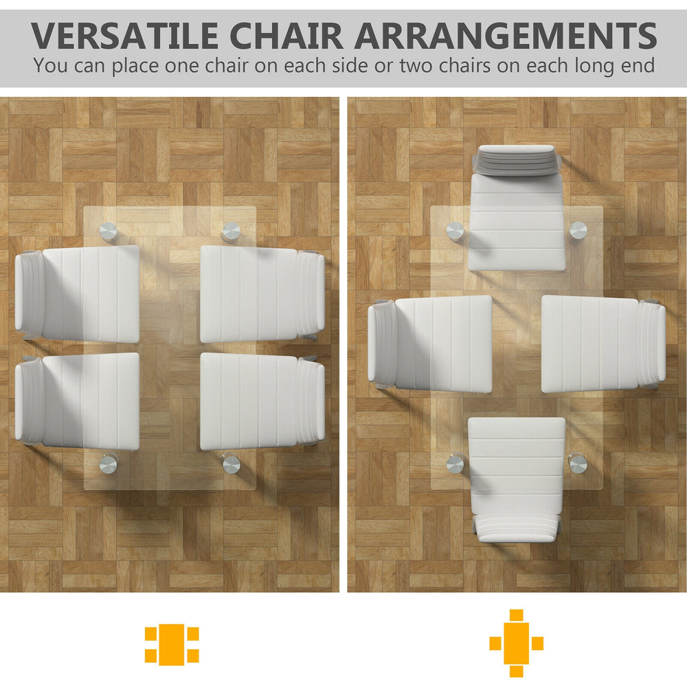 Versatile dining set arrangement showcasing a clear glass table with four PVC leather chairs for modern dining spaces.