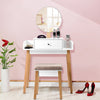 Wooden makeup dressing table set with round mirror, drawer, and cushioned stool for stylish home decor organization.
