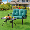 Turquoise cushioned loveseat and coffee table set on a green lawn, perfect for outdoor patio relaxation.