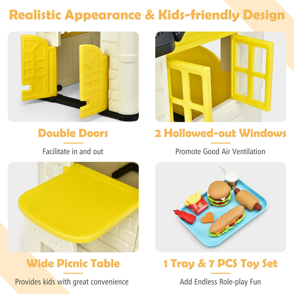Kid’s playhouse toy set in yellow featuring double doors, two windows, picnic table, and seven-piece accessory set.