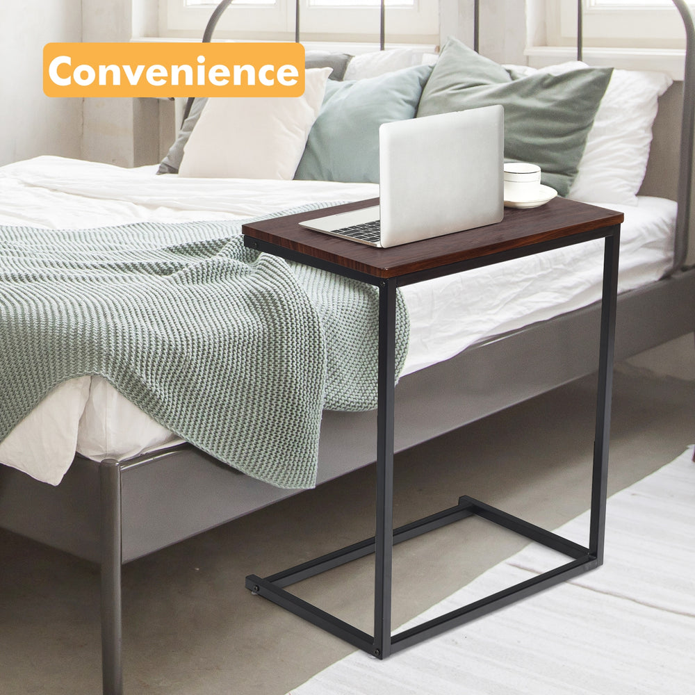 Stylish 26-inch dark brown side table with sturdy steel frame, perfect for holding laptops and snacks beside a bed or.