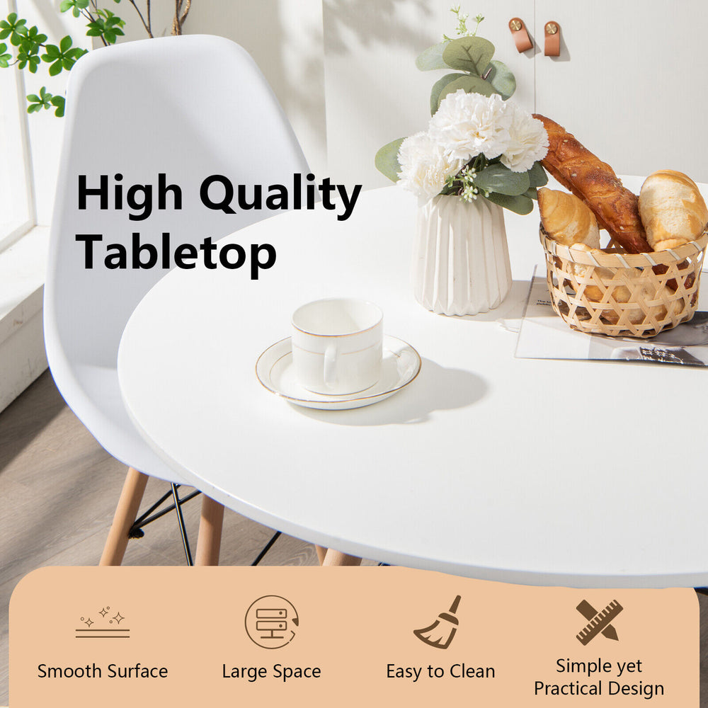 Round modern dining table with solid wooden legs, 31.5 inches, smooth surface, perfect for dining or working.