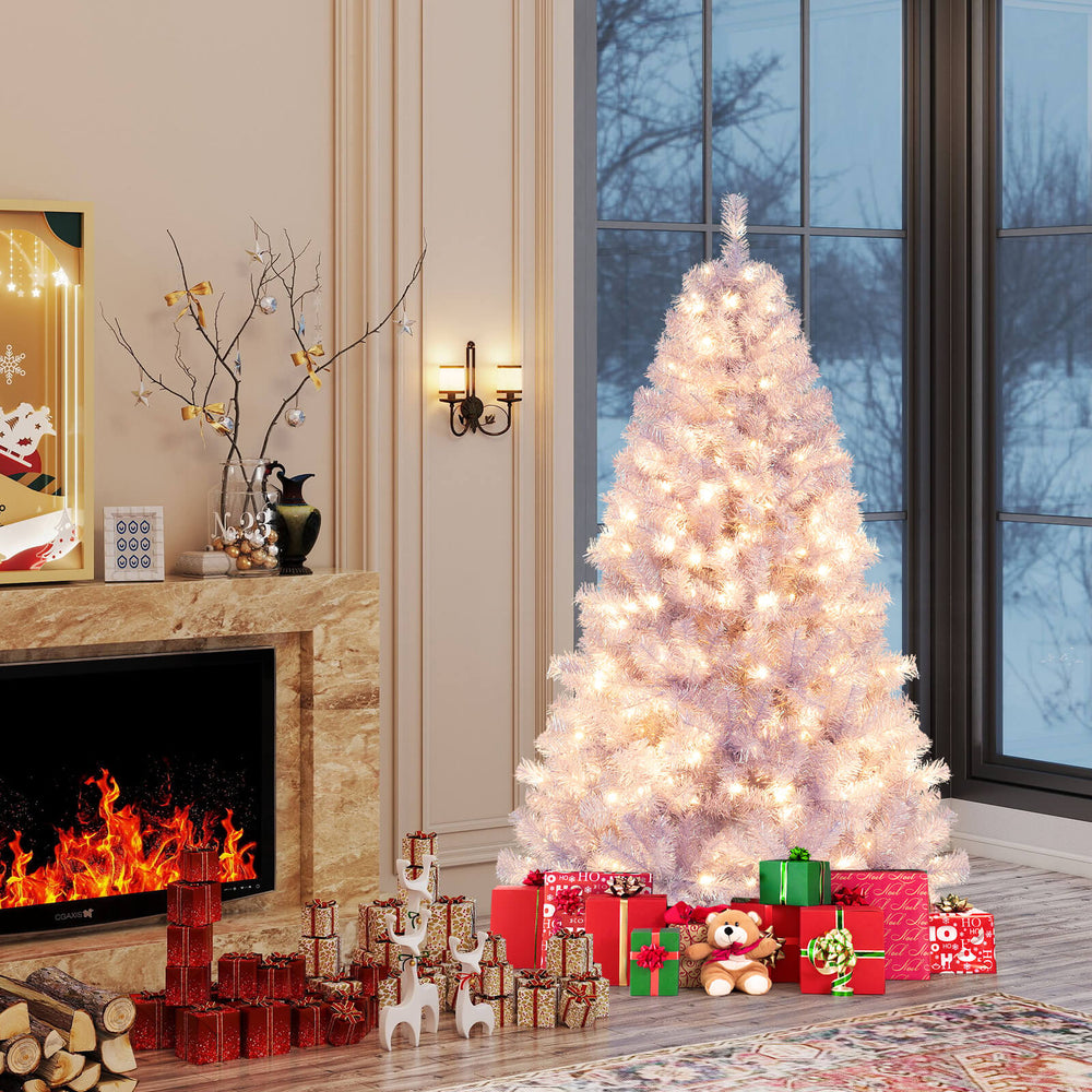 Pre-lit tinsel Christmas tree with warm white LED lights, adorned with gifts, creating a festive atmosphere in a cozy.