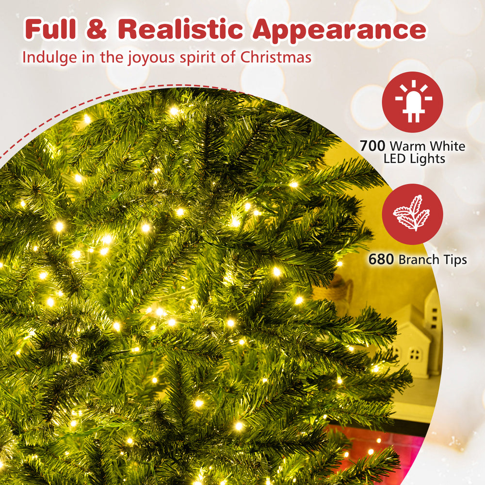 Pre-lit artificial Christmas tree with 680 branch tips and 700 warm LED lights for a full, festive appearance.