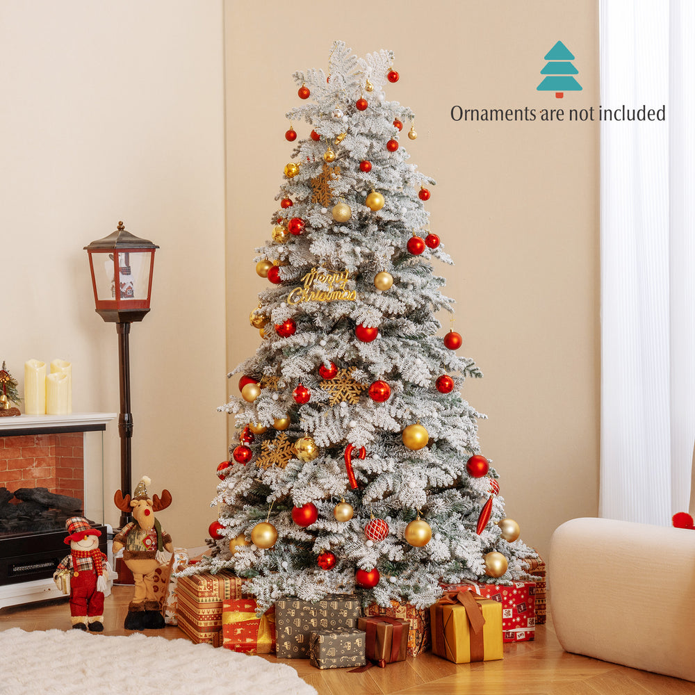 Snow-flocked 6-foot Christmas tree with 130 twinkle balls and warm white LED lights, perfect for festive decorations.