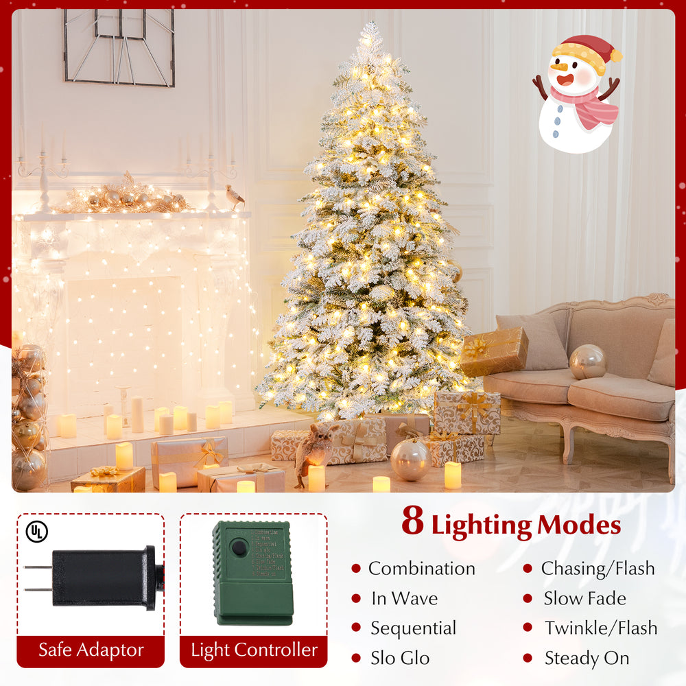 6-foot snow-flocked Christmas tree with 260 warm white LED lights and 8 lighting modes, ideal for festive decorations.
