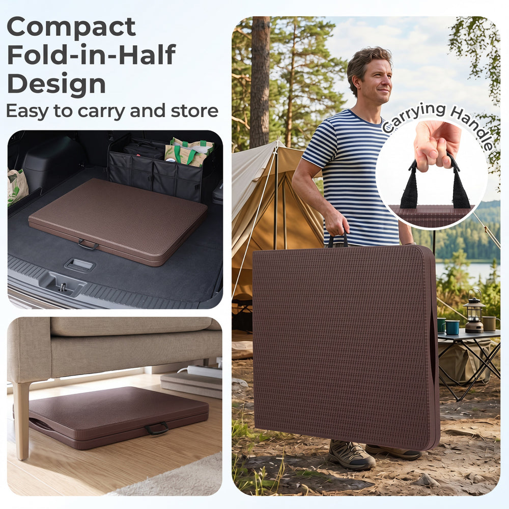 Compact 6 FT fold-in-half camping table with simulated rattan texture and carrying handle for easy transport and storage.