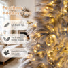 6 FT pre-lit Christmas tree featuring feather-inspired branch tips, warm white LED lights, and a stable metal base for holiday decor.