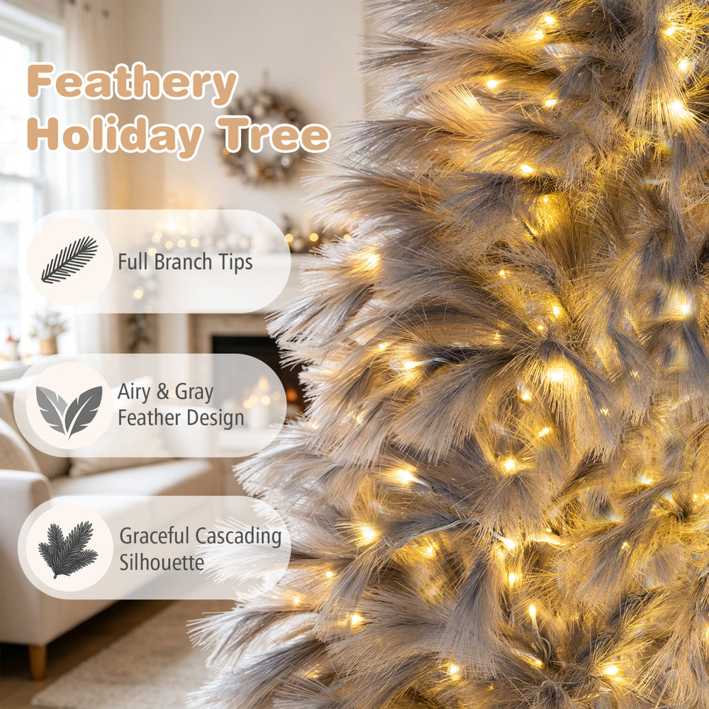 6 FT pre-lit Christmas tree featuring feather-inspired branch tips, warm white LED lights, and a stable metal base for holiday decor.