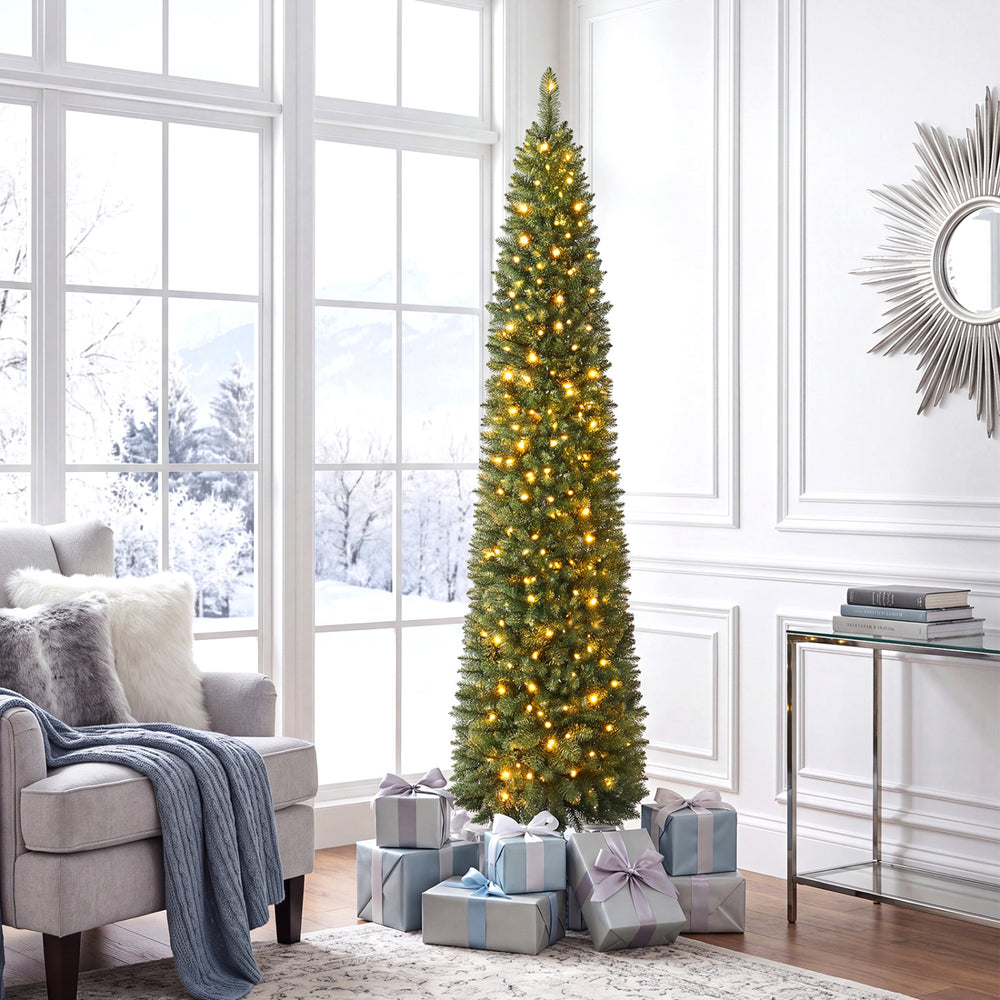 6 FT pre-lit pencil Christmas tree with 180 warm white LED lights, perfect for small spaces and creating a cozy holiday atmosphere.