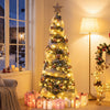 Pre-lit 6 FT Christmas tree with 150 warm white LED lights, adorned with pink balls and delicate bows for festive charm.