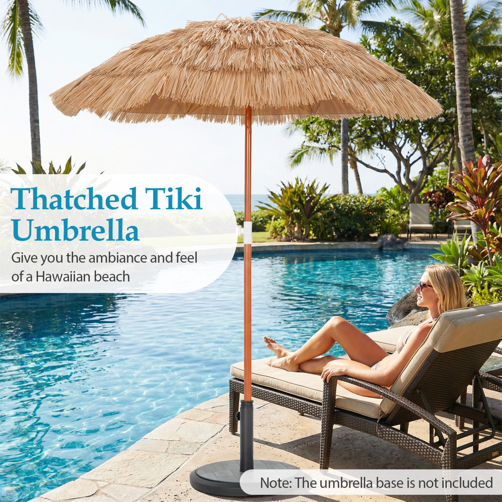 Thatched Tiki umbrella with 40° tilt adjustment, perfect for beach or garden use, showcasing a natural look by the pool.