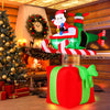 Santa Claus pilots a helicopter on a large red gift, featuring 3 LED lights for festive outdoor decoration.
