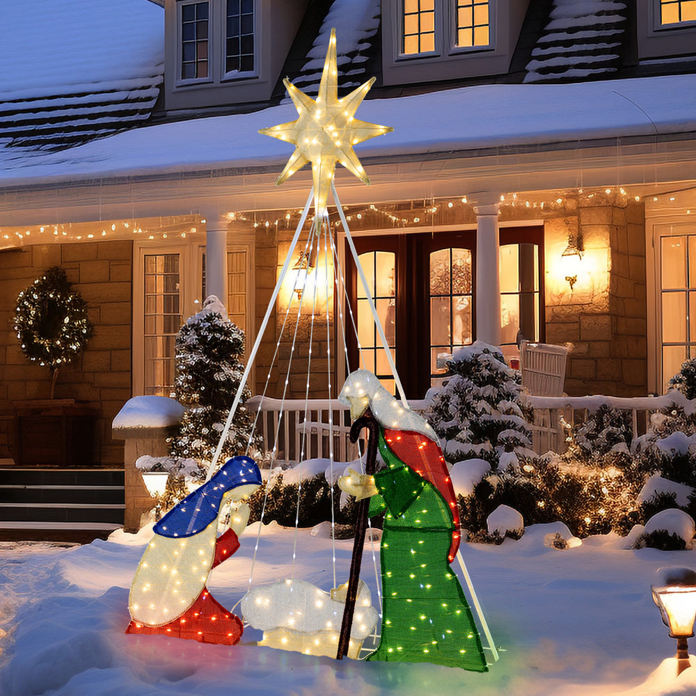 Lighted 6 feet nativity scene featuring Jesus, Mary, and Joseph with 240 LED lights for festive outdoor decoration.